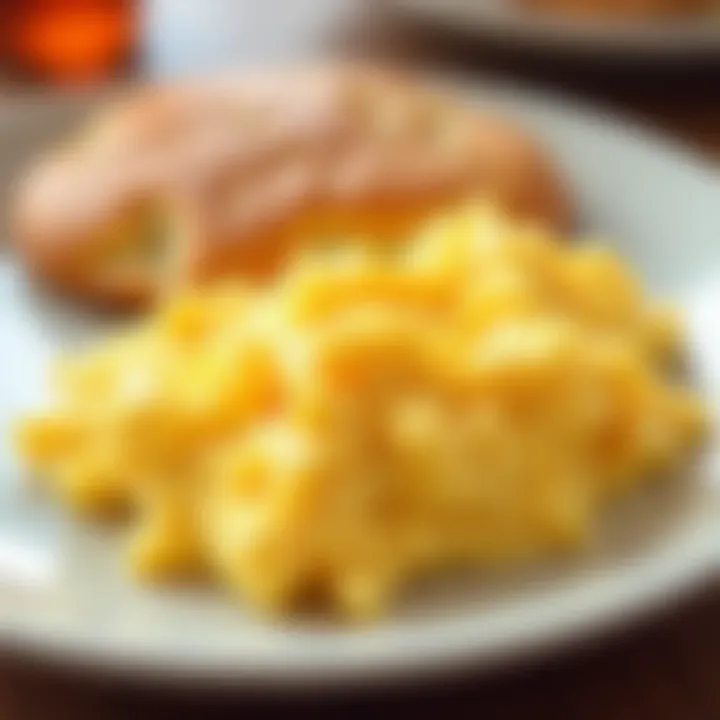 A close-up of perfectly cooked scrambled eggs with a fluffy texture